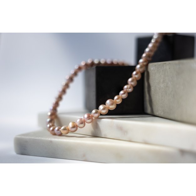 Kreminis upinių perlų vėrinys 1